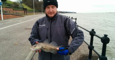 Myself holding a Cod I just caught at the Town Hall Steps fishing mark