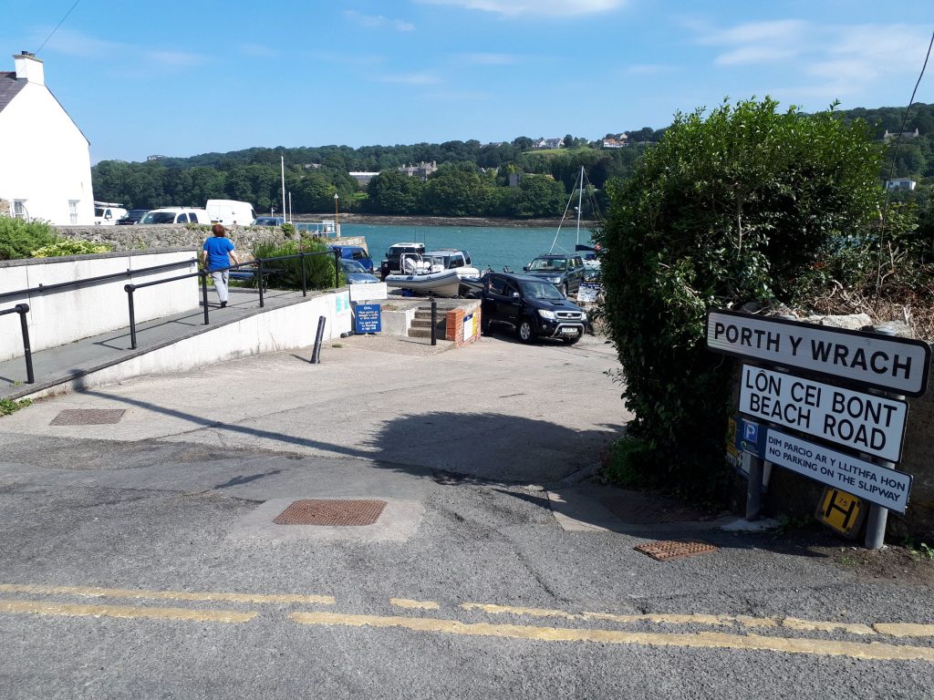 The image shows the entrance to the slipway at Menai Bridge